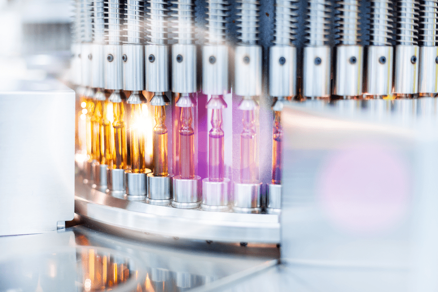 Vials of colorful liquid inside test tubes on a centrifuge